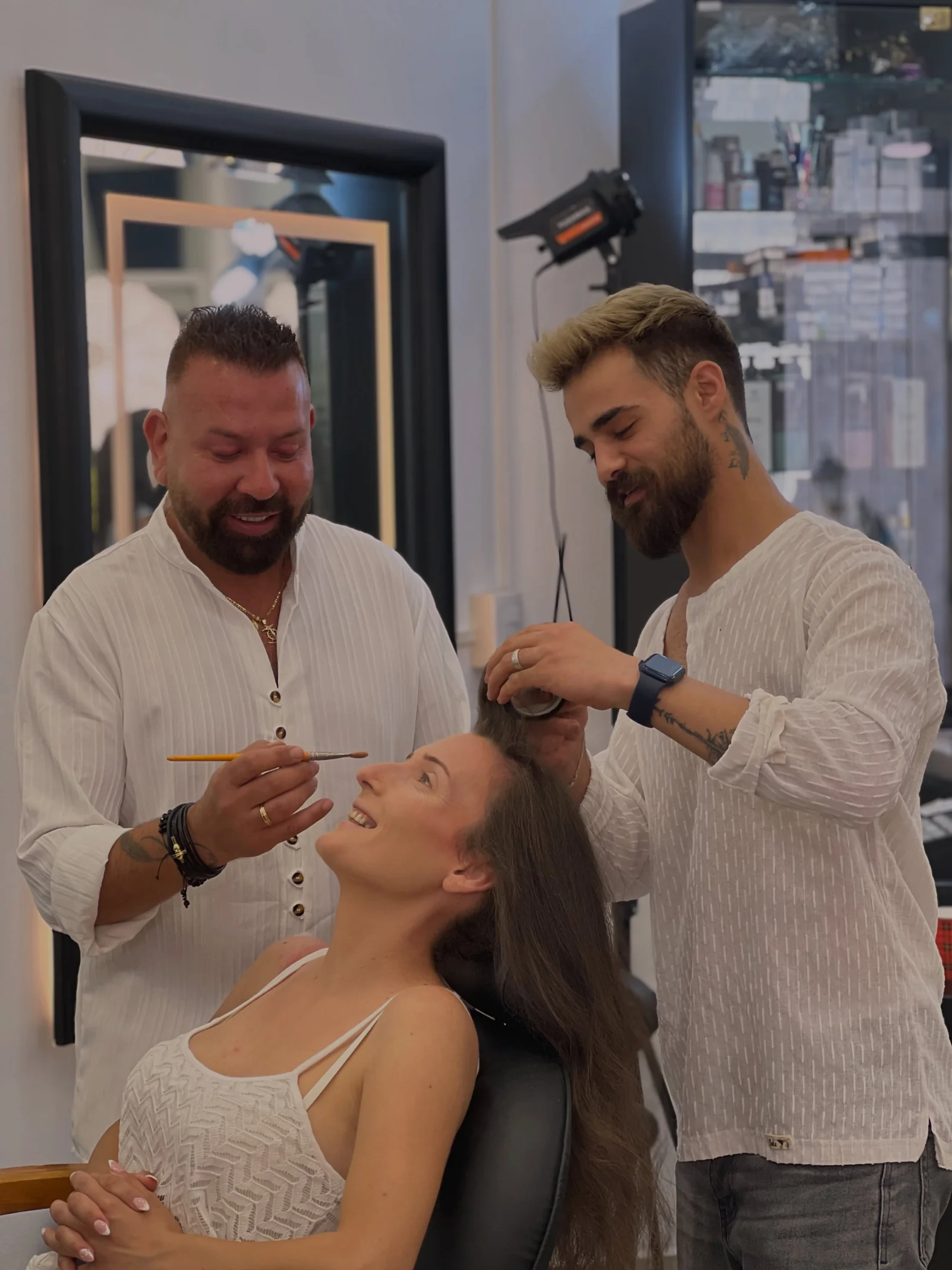 Fadi Bassil and his hair specialist preparing a client's makeup and hair
